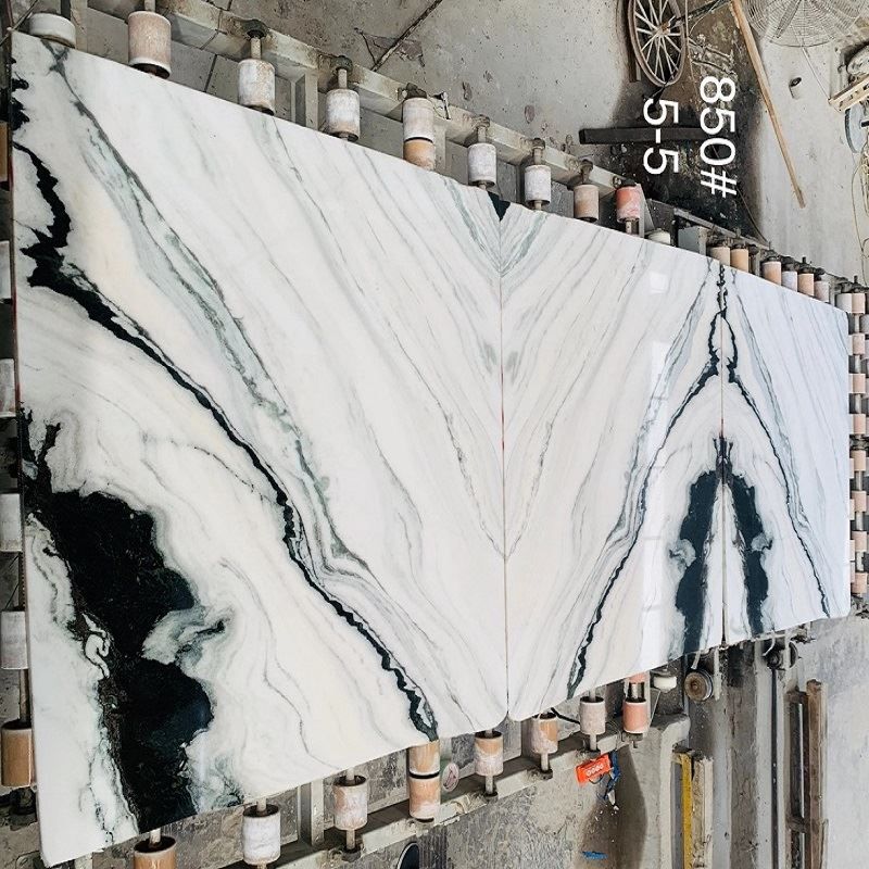 bookmatched panda white marble.jpg