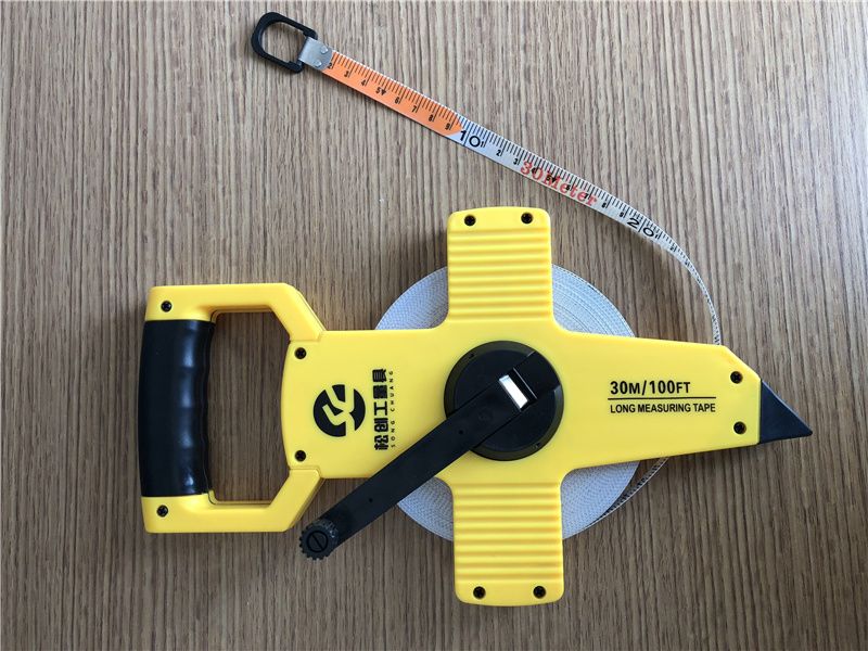 Rubber covered frame fiber pressure resistant steel frame tape measure from China factory