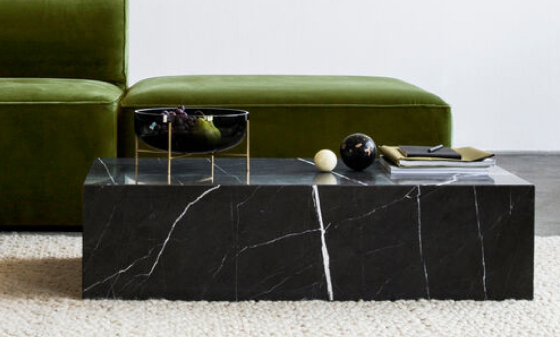 Enchanting Elegance: The Marble Plinth Coffee Table