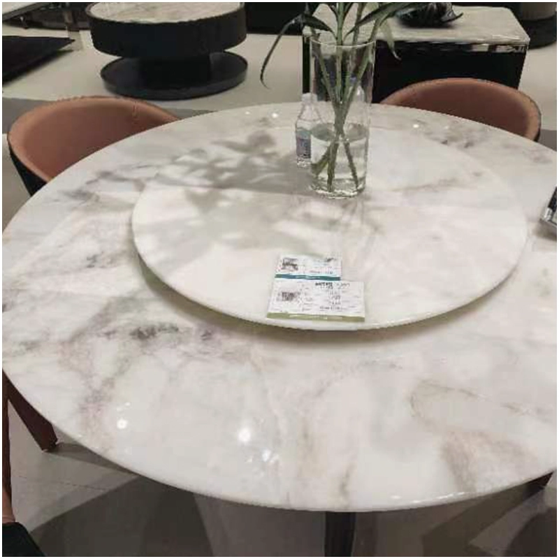 Dover Whtie Quartzite Round Dining Tables with Susan Lazy