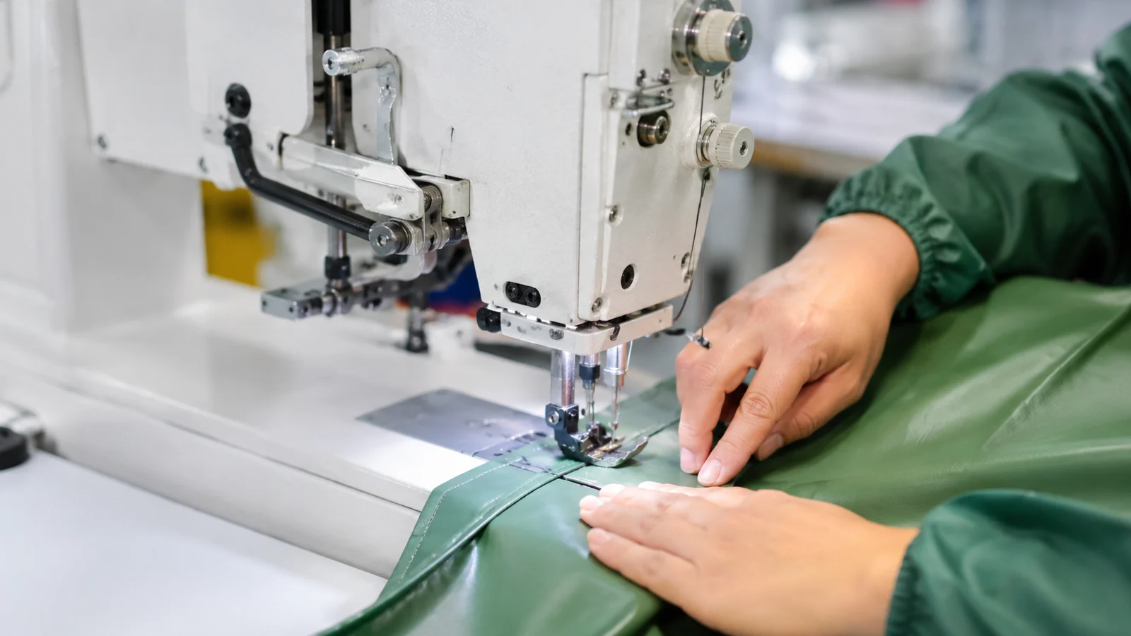 Rainwear sewing machine quality check during production